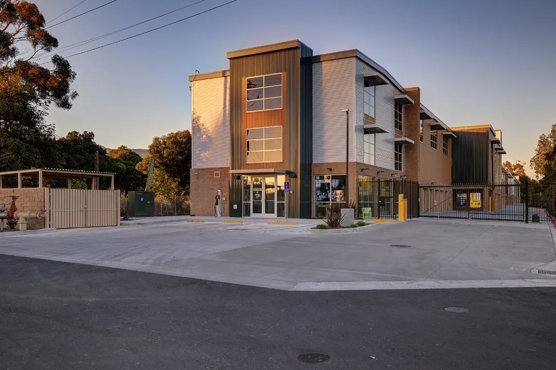 Modern building with a parking area.