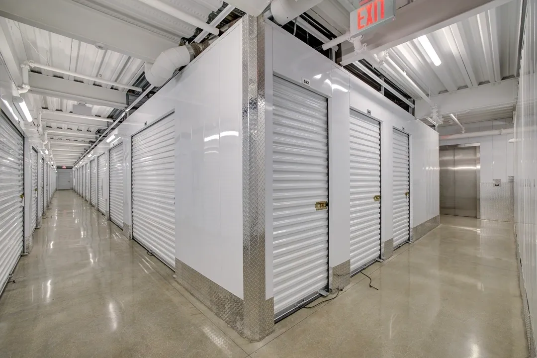 Storage units in a clean hallway.