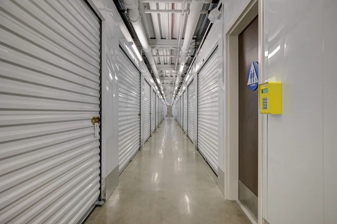 Storage units hallway with closed doors.