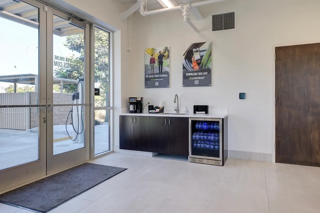 Modern reception area with beverage station.