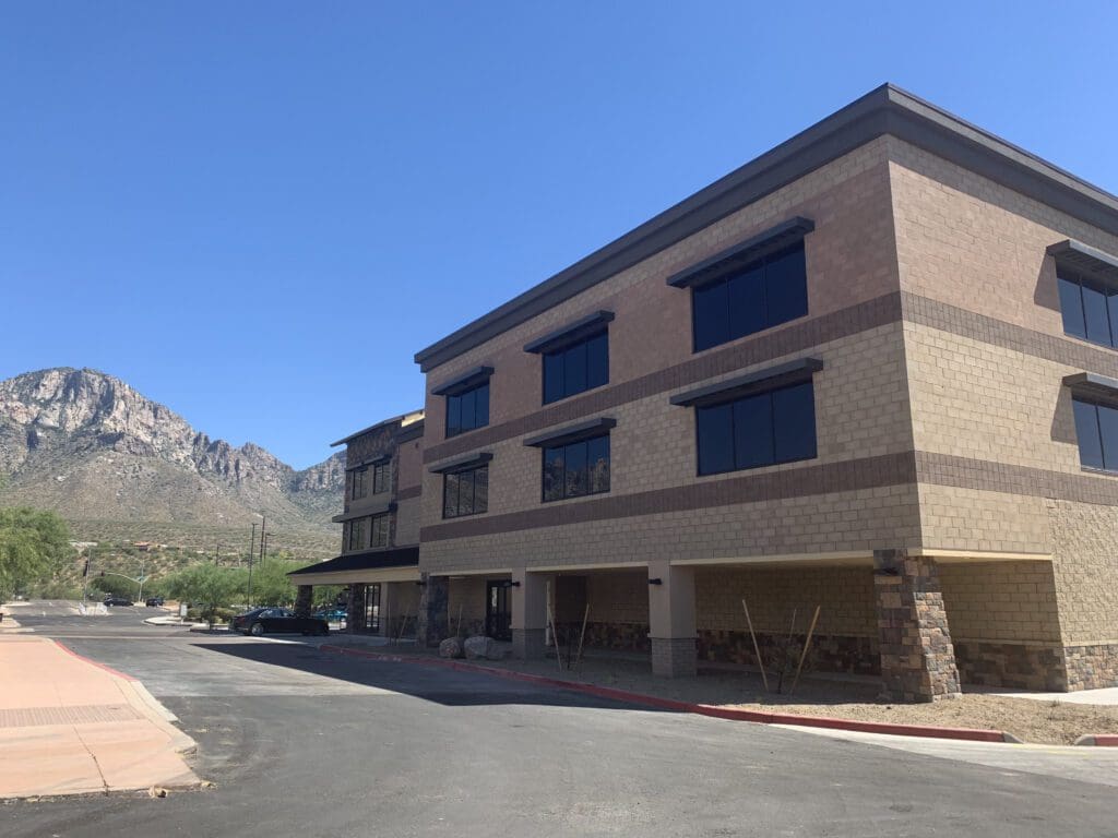 Tucson Steam Pump Self Storage building exterior with windows and mountain view