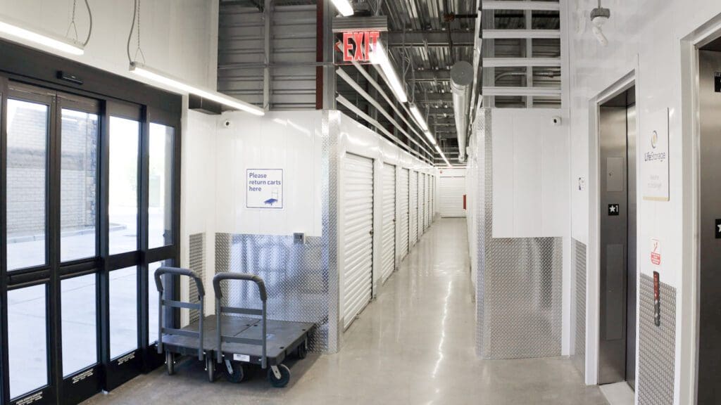 Tucson Steam Pump Self Storage interior hallways with polished floors and white units