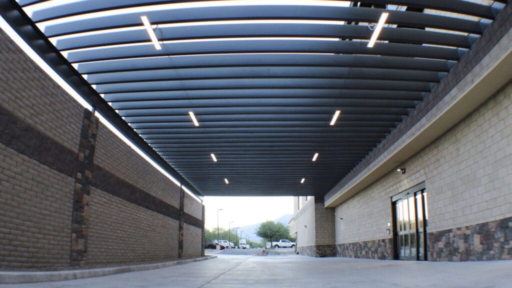 Tucson Steam Pump Self Storage exterior loading bay with wood beams for shading