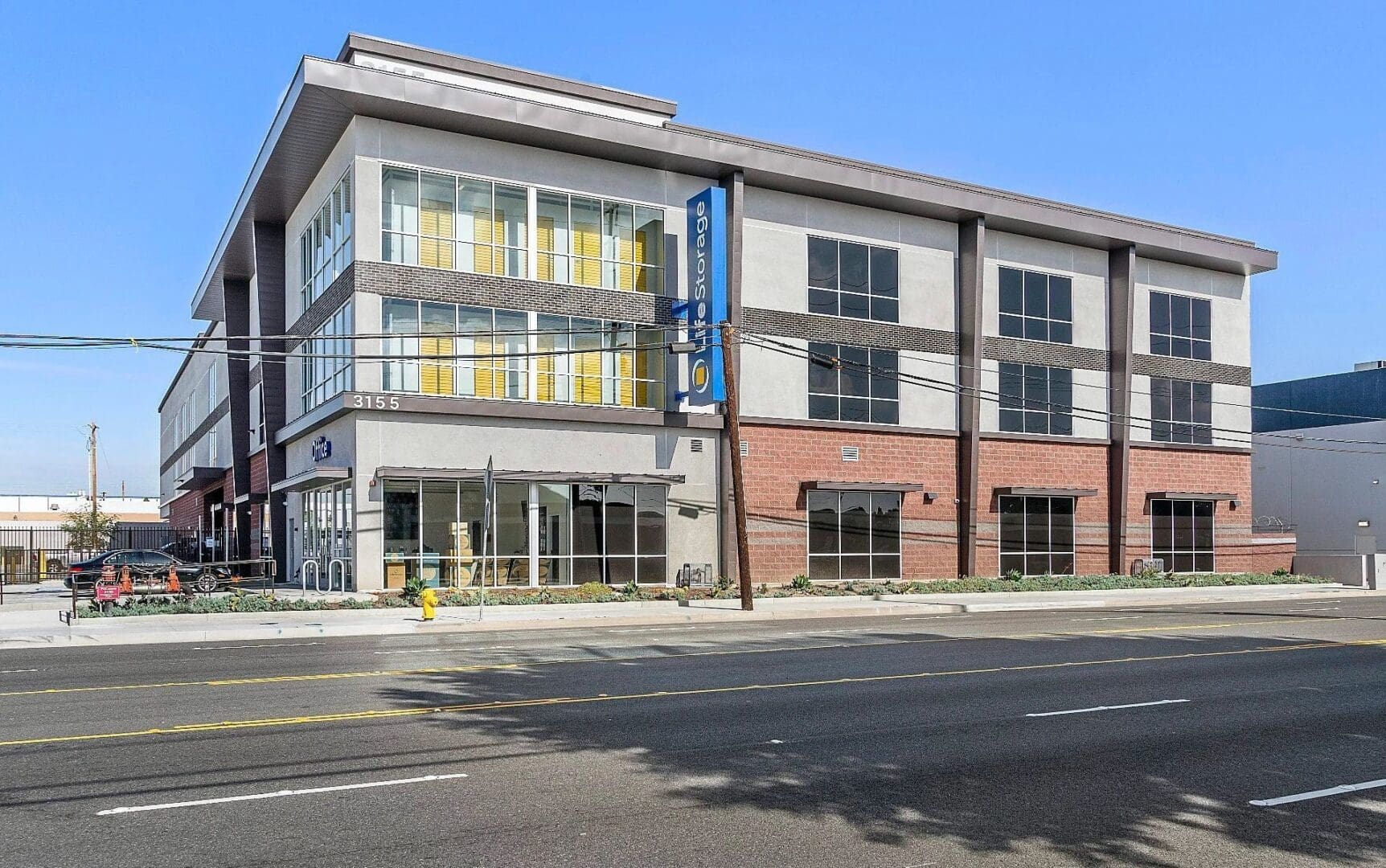 Modern commercial building with large windows.