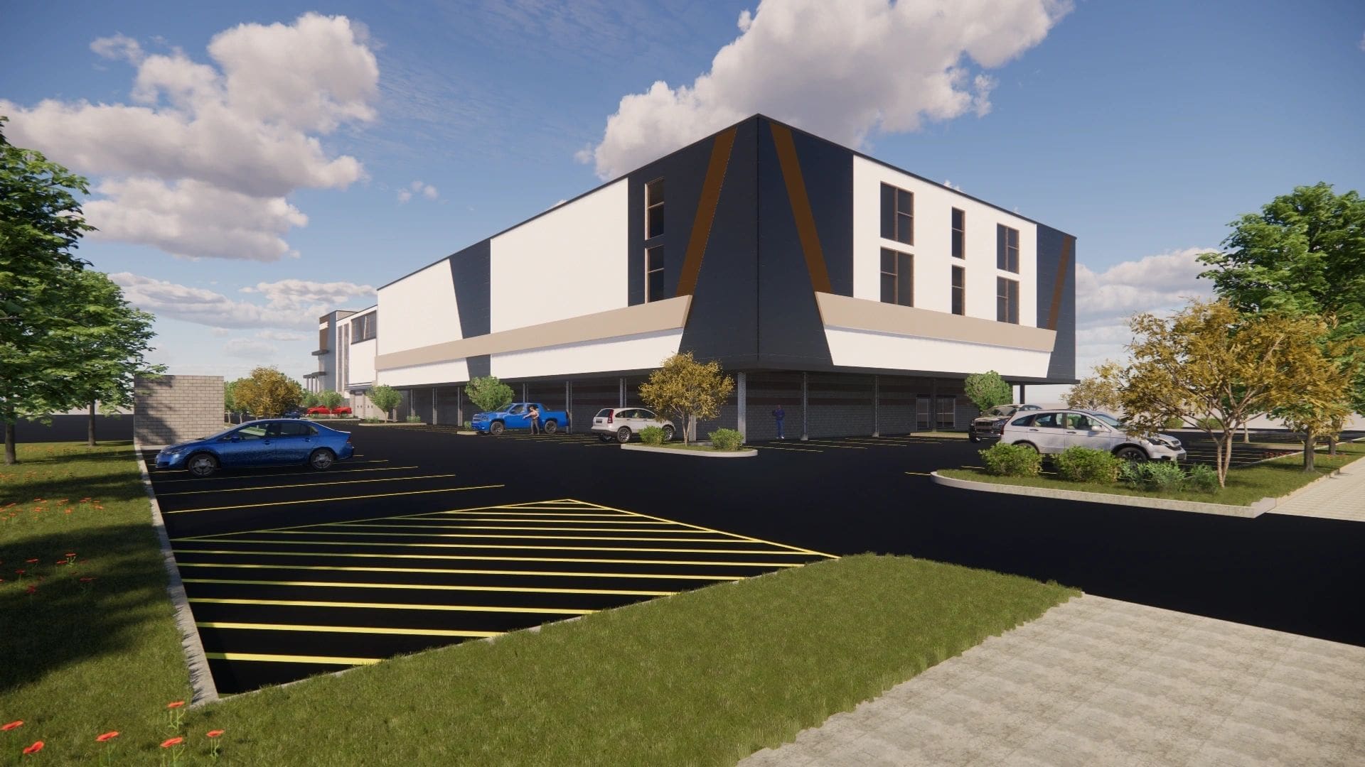 Modern building with parking lot and trees.