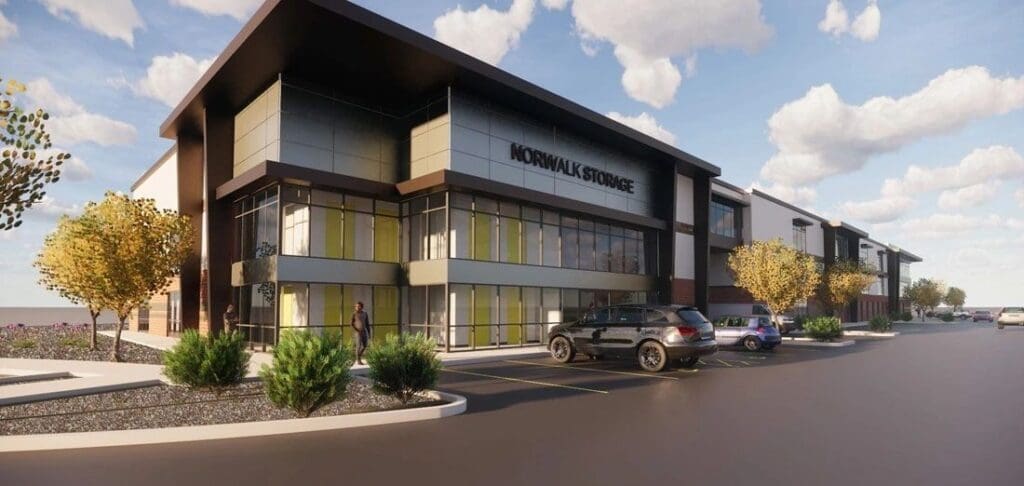 Modern storage facility exterior with landscaping.