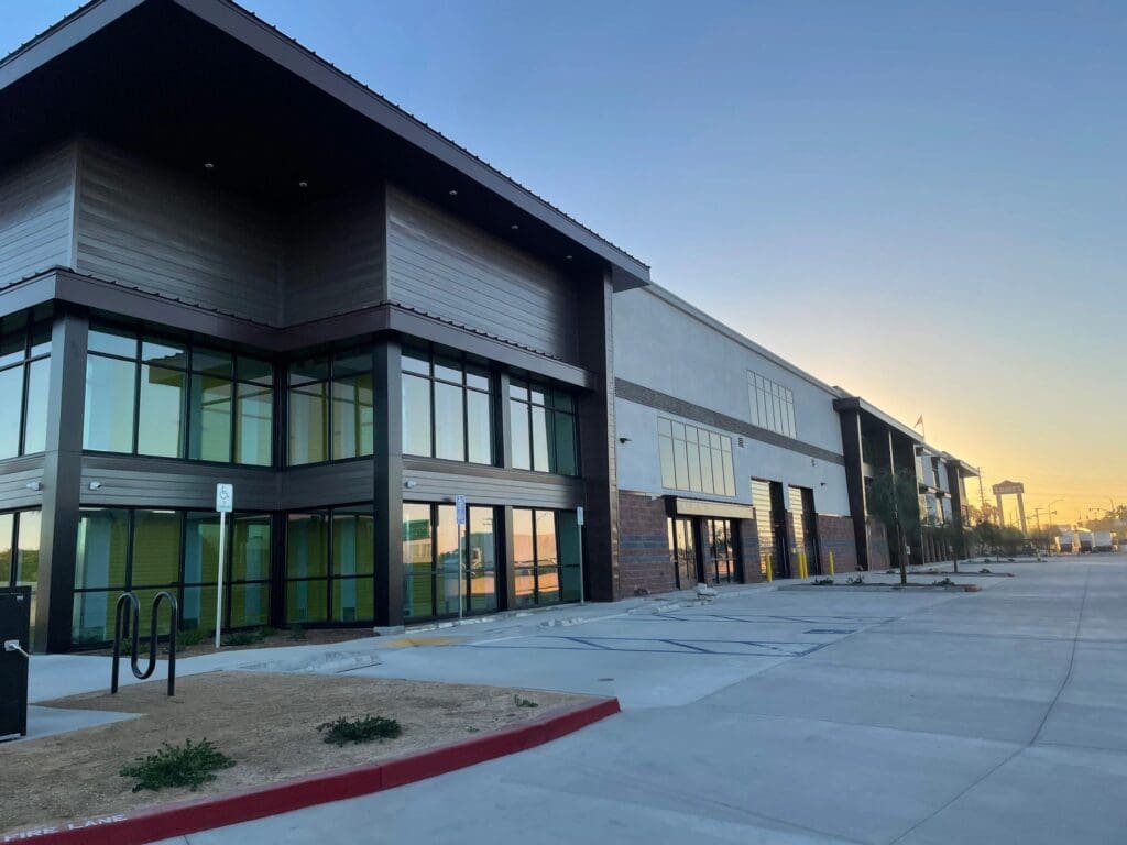 Modern commercial building with large windows.