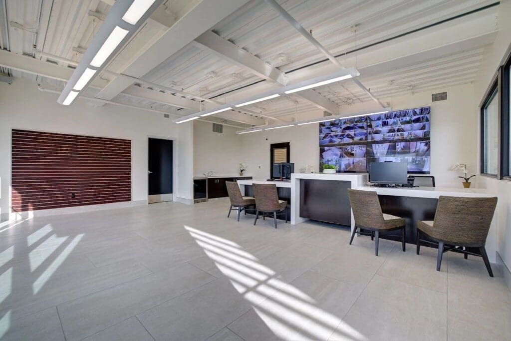 Modern office reception area with seating.