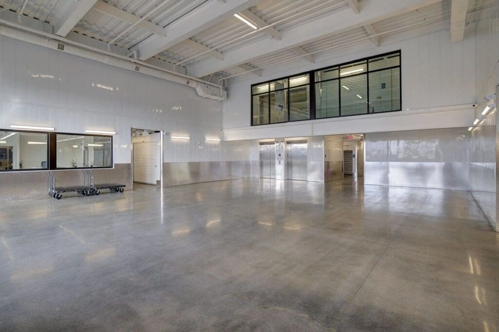 Spacious modern interior with glossy flooring.