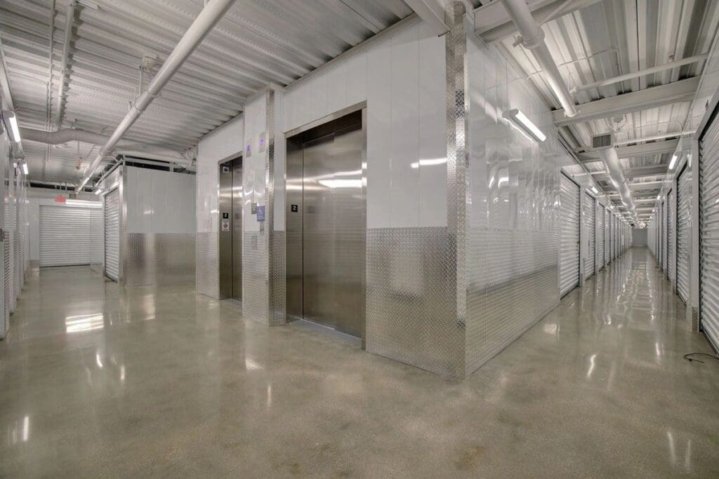 Interior of a modern storage facility corridor.