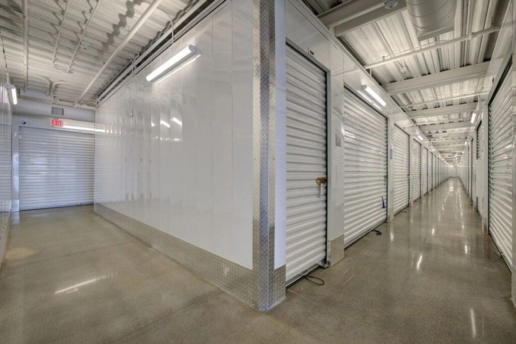Storage unit hallway with metal doors.