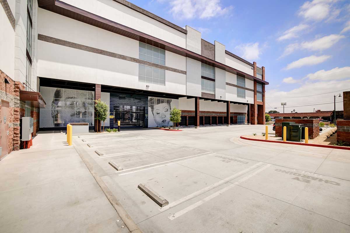 A Parking Area In Front Of A Building