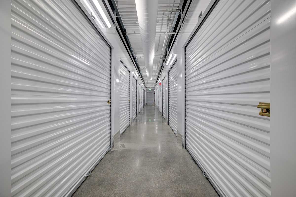 Clean and polished floors with white storage units