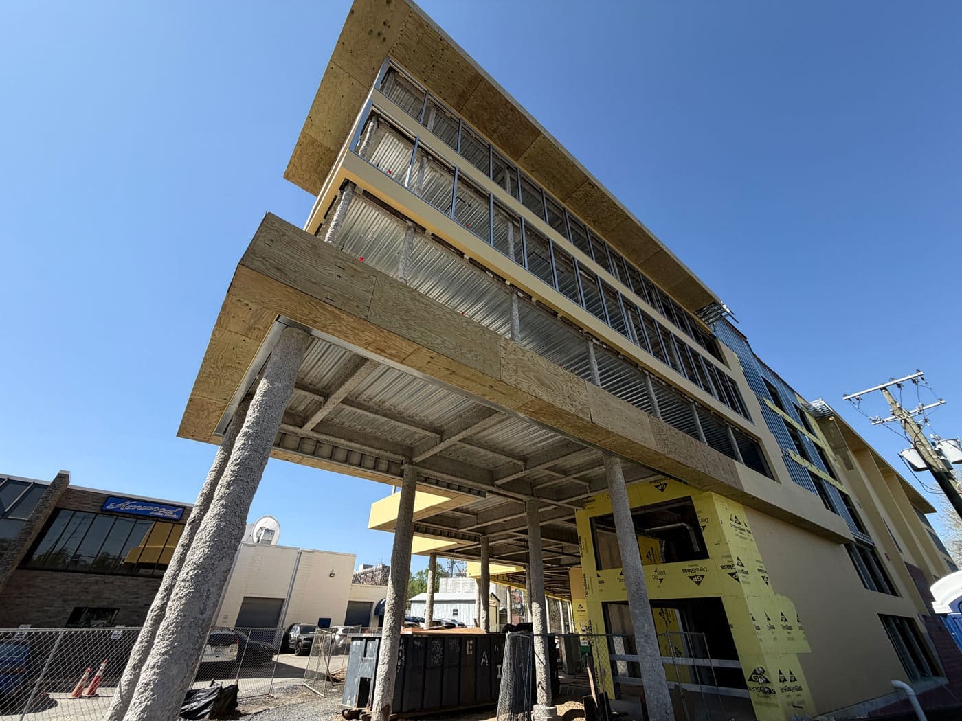 Photo of multi-level storage building with windows and brick exterior