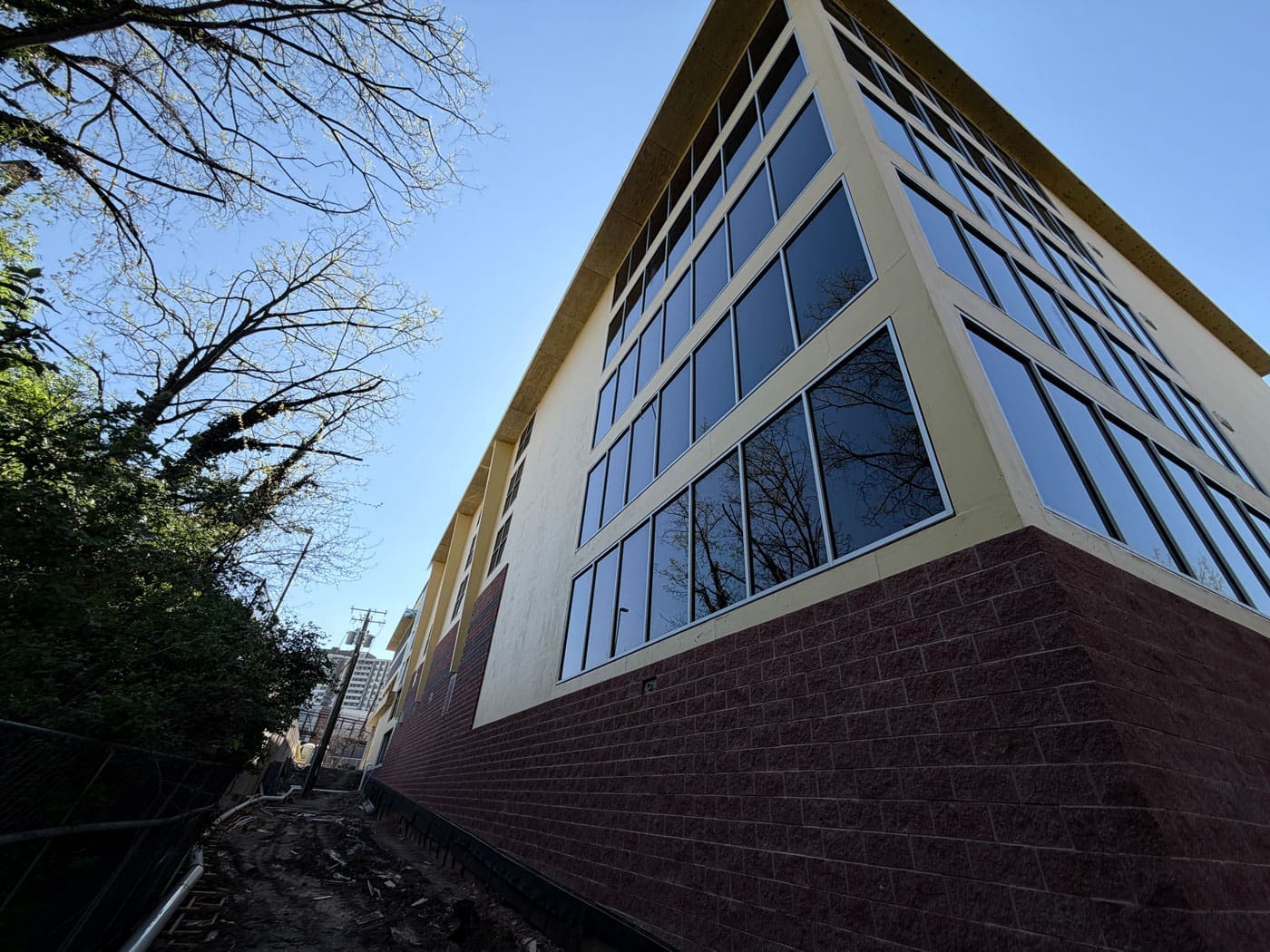 Photo of multi-level storage building with windows and brick exterior